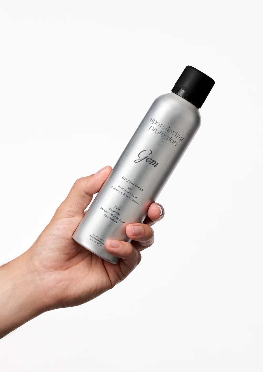 GEM skin-loving dry spray, held in hand
