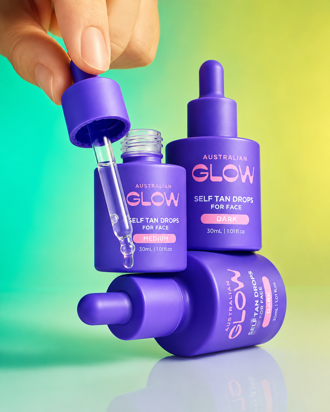 Australian Glow Self Tan Drops for Face — pipette over second bottle on gradient