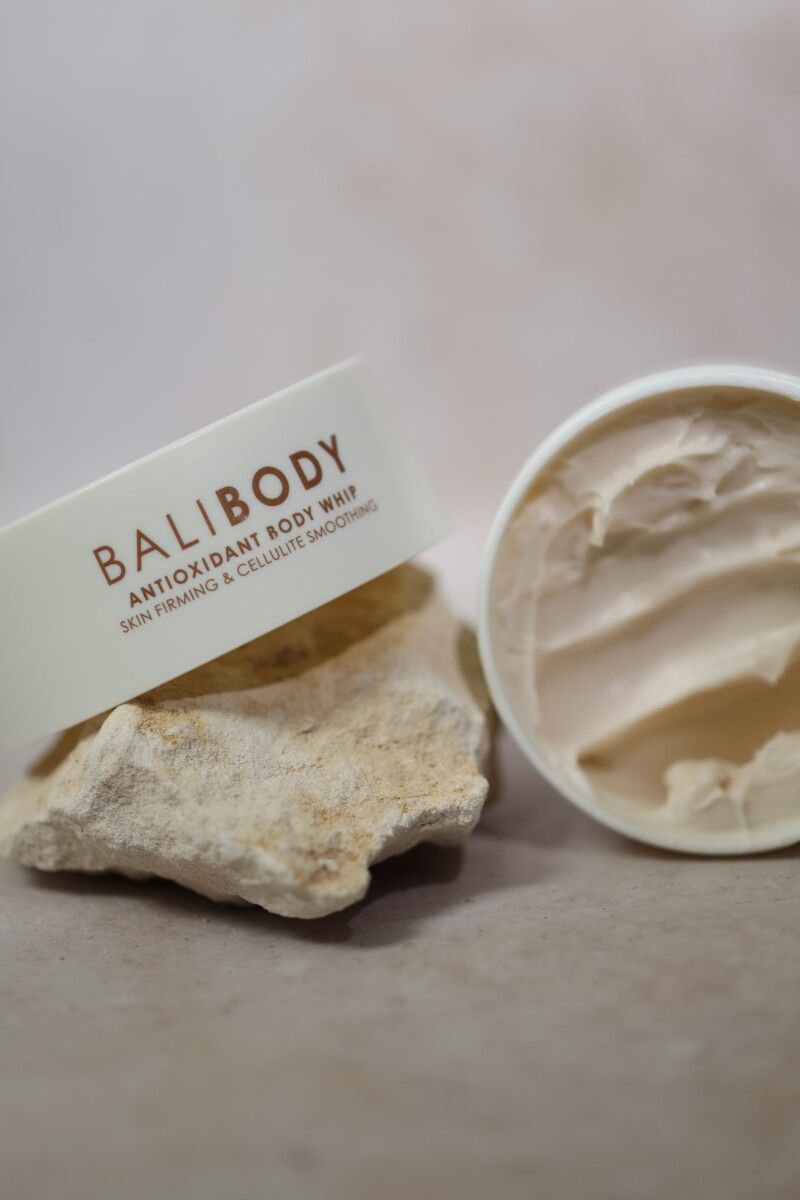 Bali Body Antioxidant Body Whip with stone on neutral surface