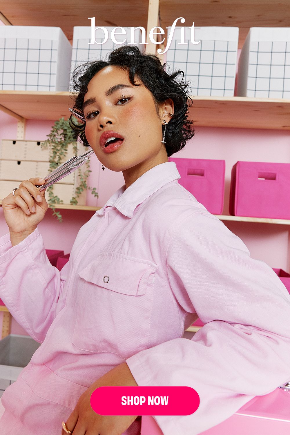 Benefit campaign model with eyelash curler