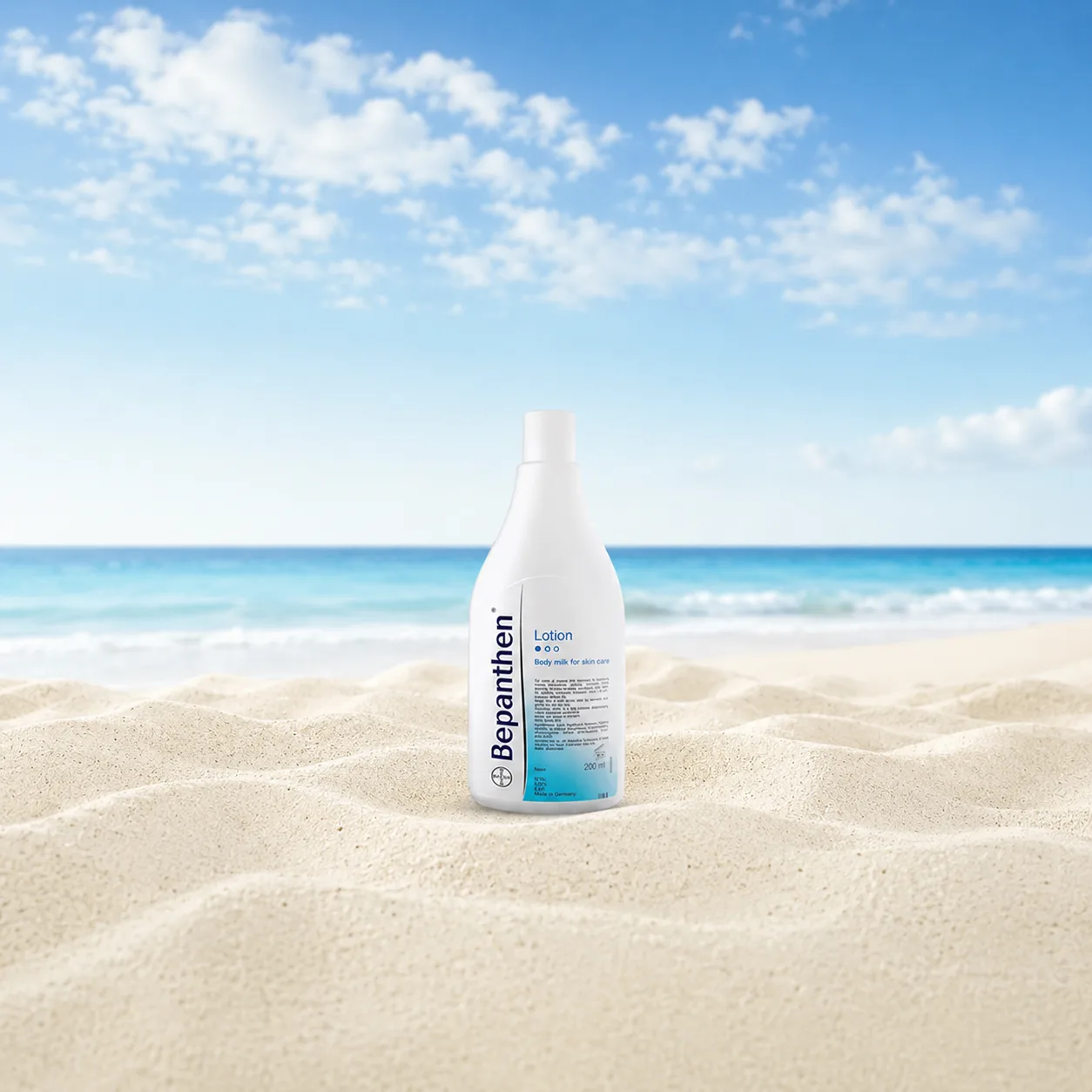 Bepanthen lotion bottle on Australian sand, the beach-bag staple