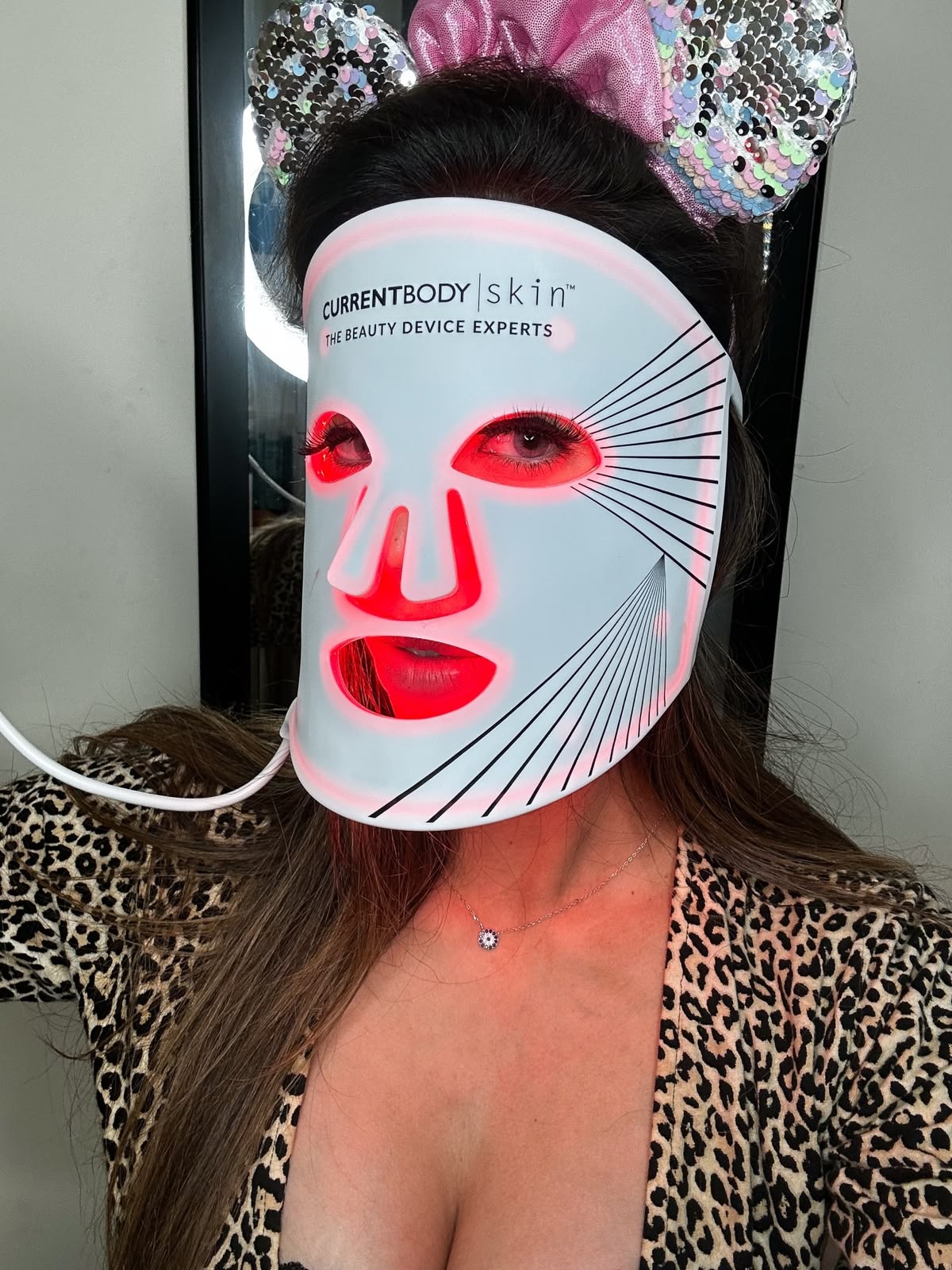CurrentBody Skin LED Mask worn for at-home treatment portrait