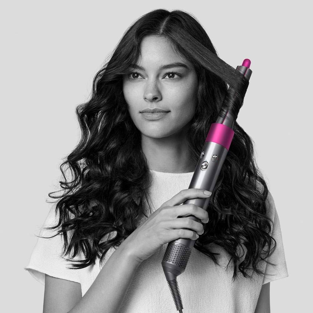 Dyson Airwrap in use — salon-grade styling at home
