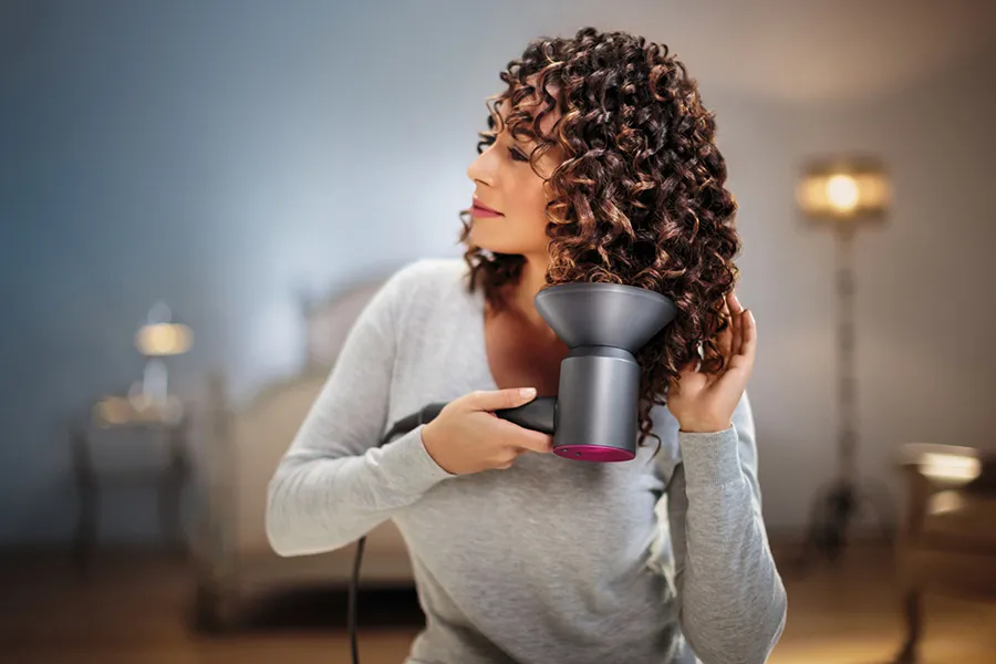 Dyson Supersonic with curly hair — styling editorial