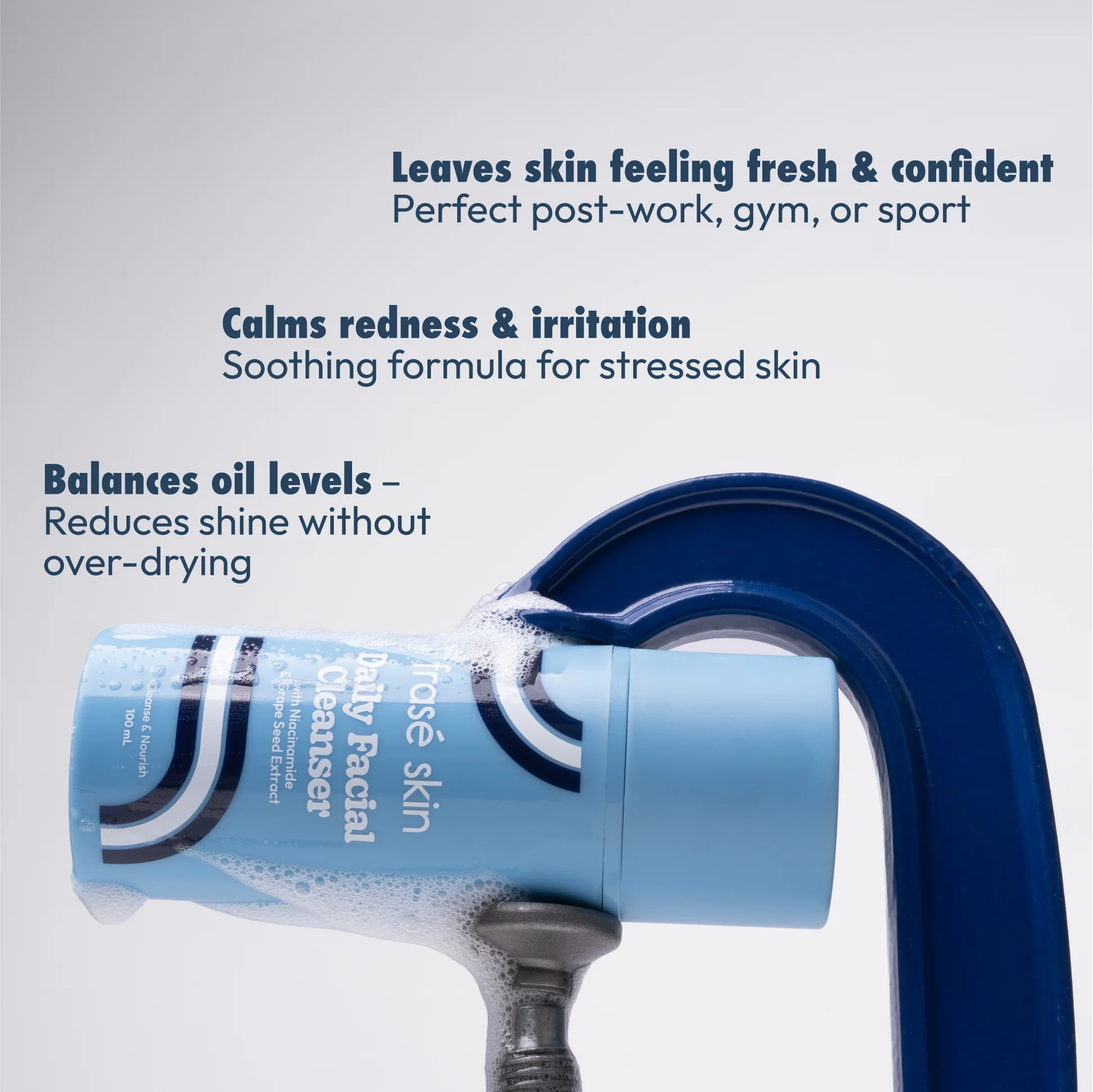 Frasé Skin Daily Facial Cleanser under a chrome shower hose