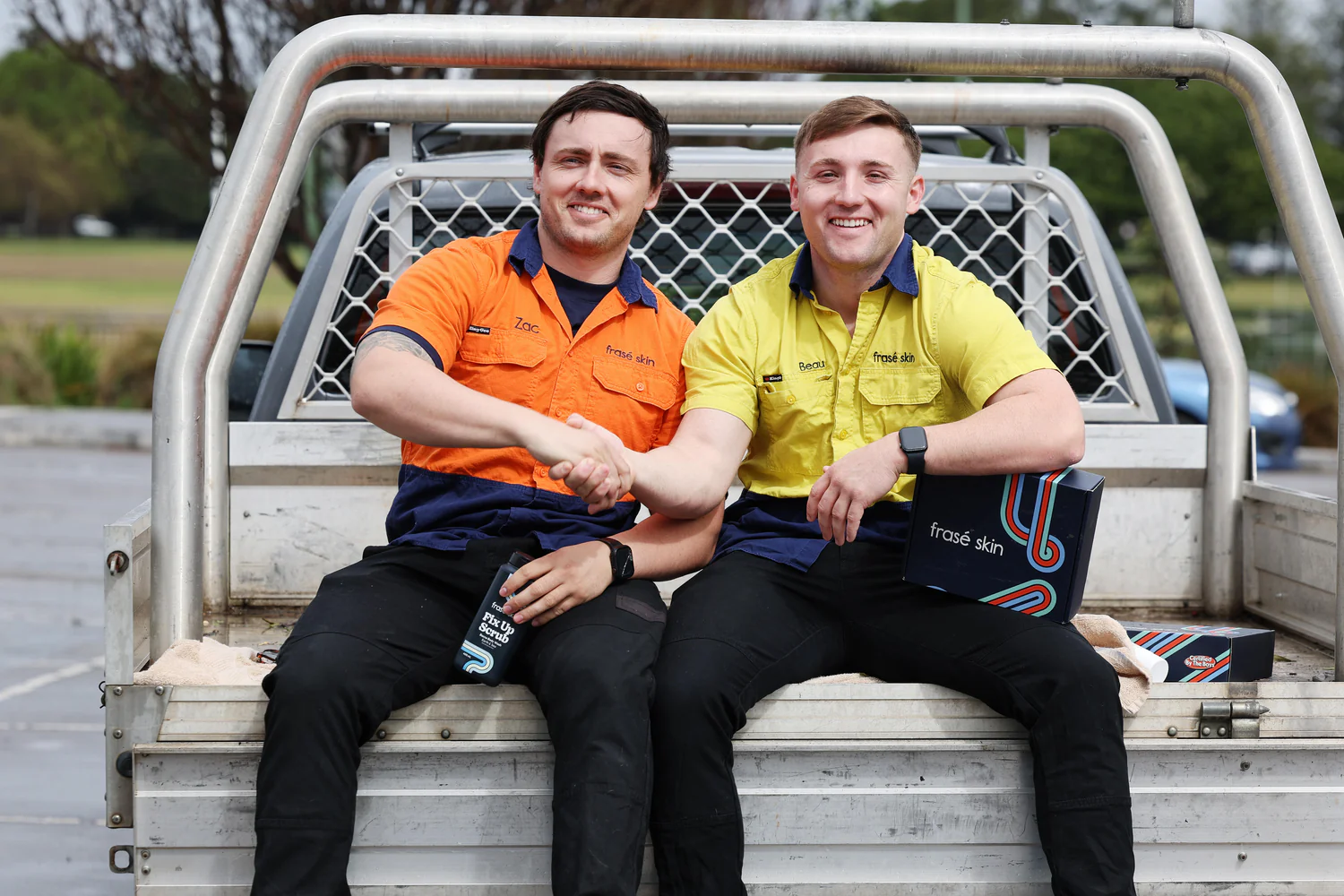 Frasé Skin founders Zac and Beau London on the back of a ute, Newcastle NSW