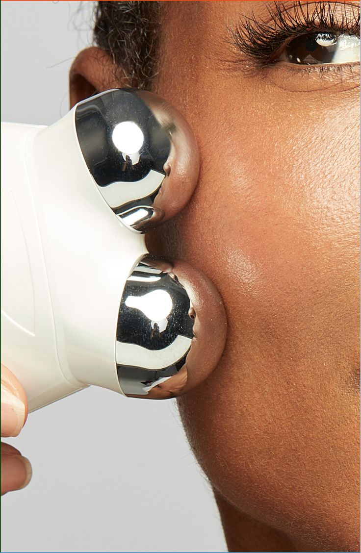 NuFACE Trinity contact spheres on skin close-up — clinical microcurrent contact