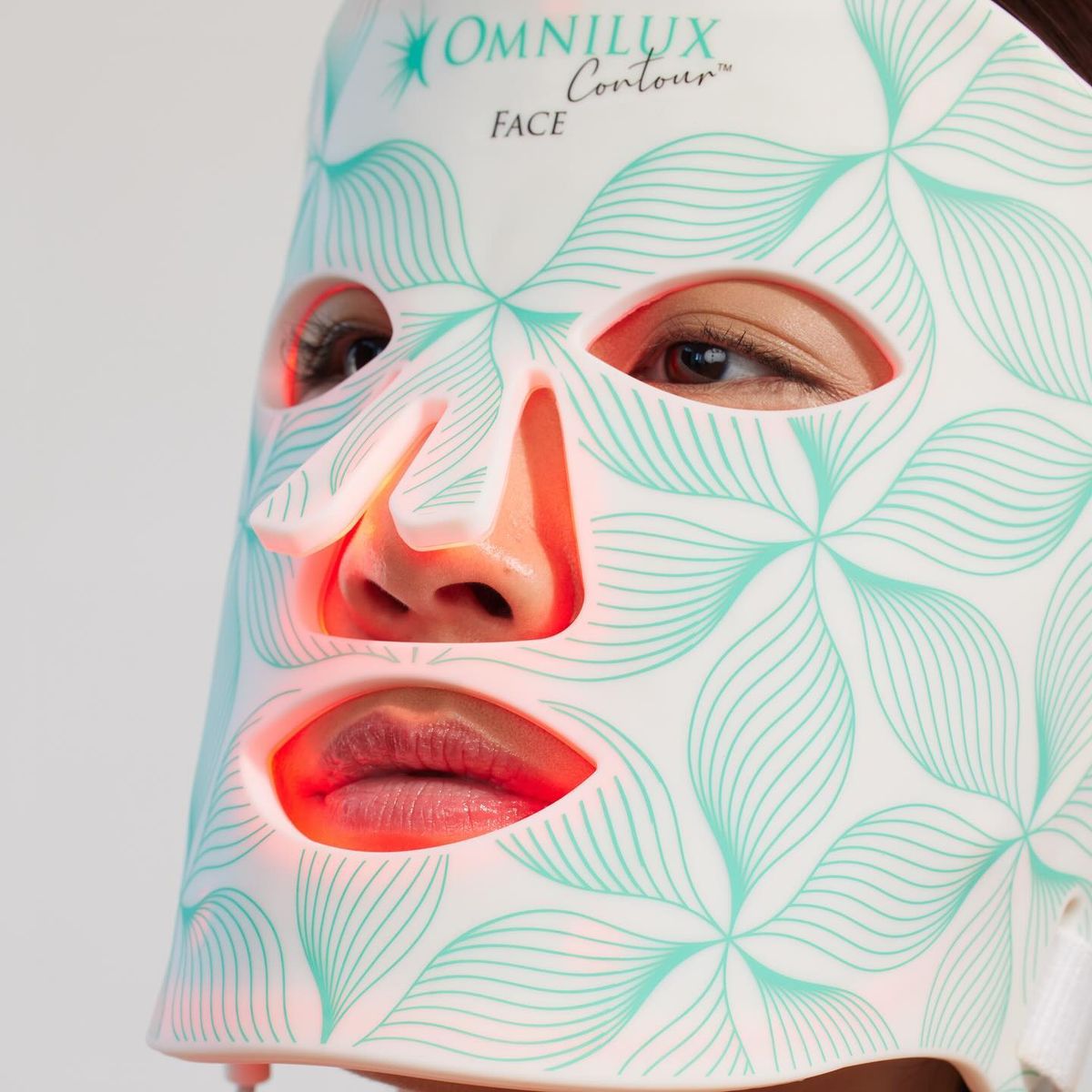 Omnilux Contour Face close-up worn on user