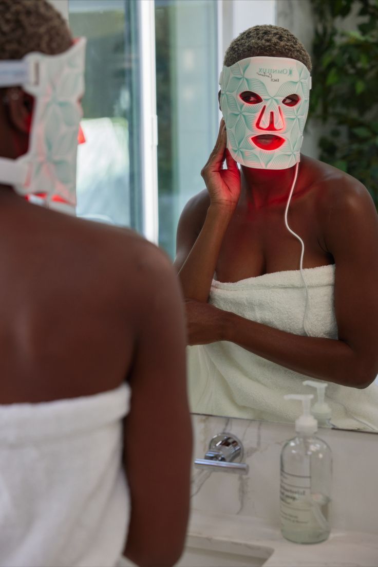 Omnilux Contour Face used at-home in mirror — the daily routine