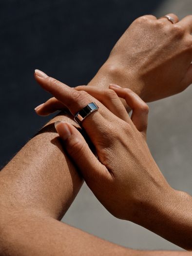 Oura Ring editorial — portrait shot of the ring worn naturally