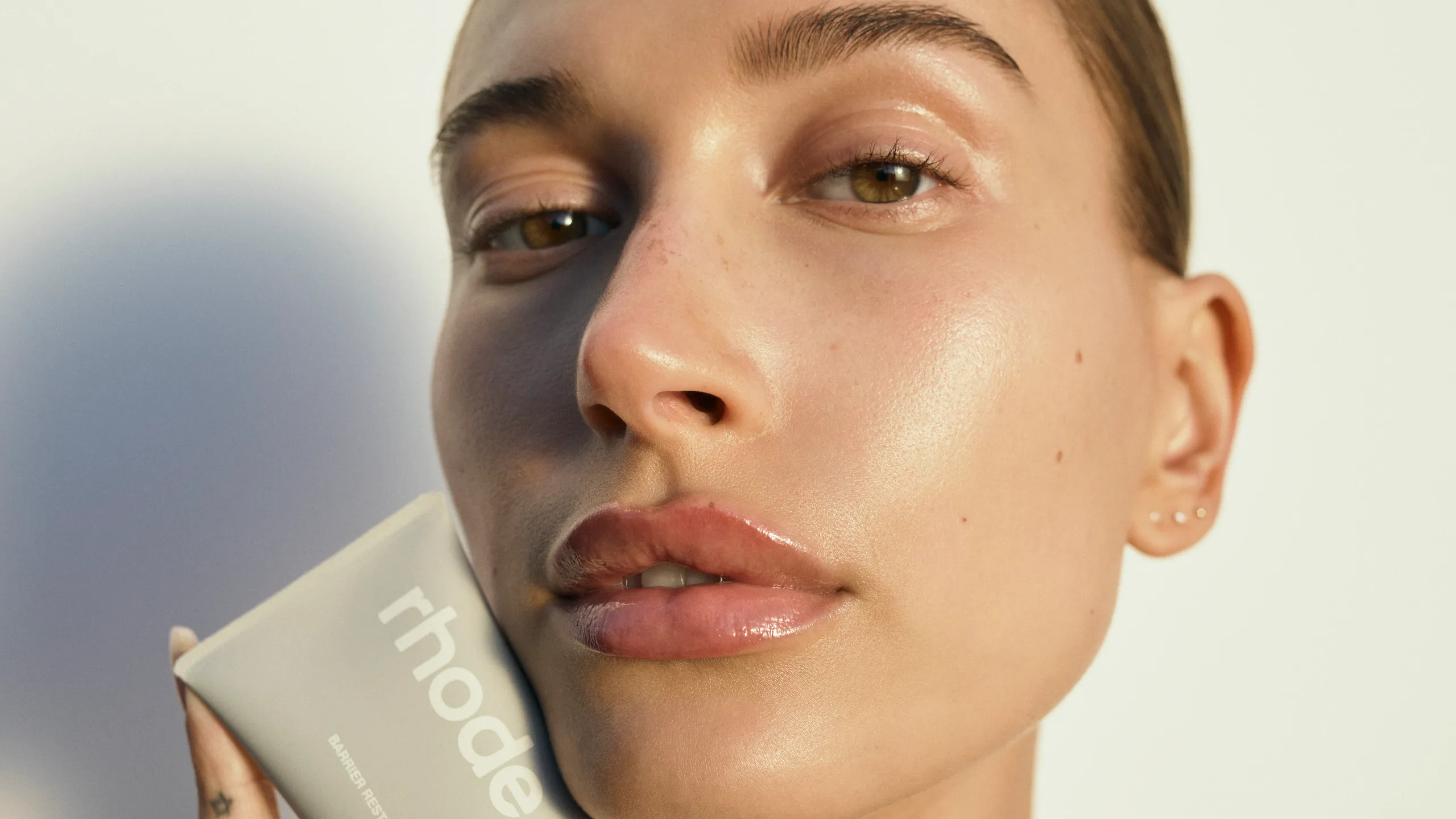 Hailey Bieber · Rhode Barrier Restore Cream campaign · 2024