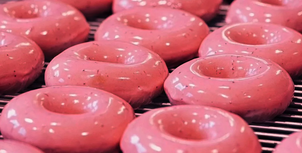rhode x Krispy Kreme strawberry glaze collab