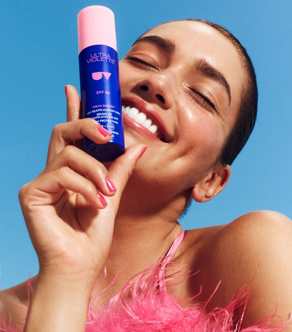 Ultra Violette product still — bottle and tube on neutral surface