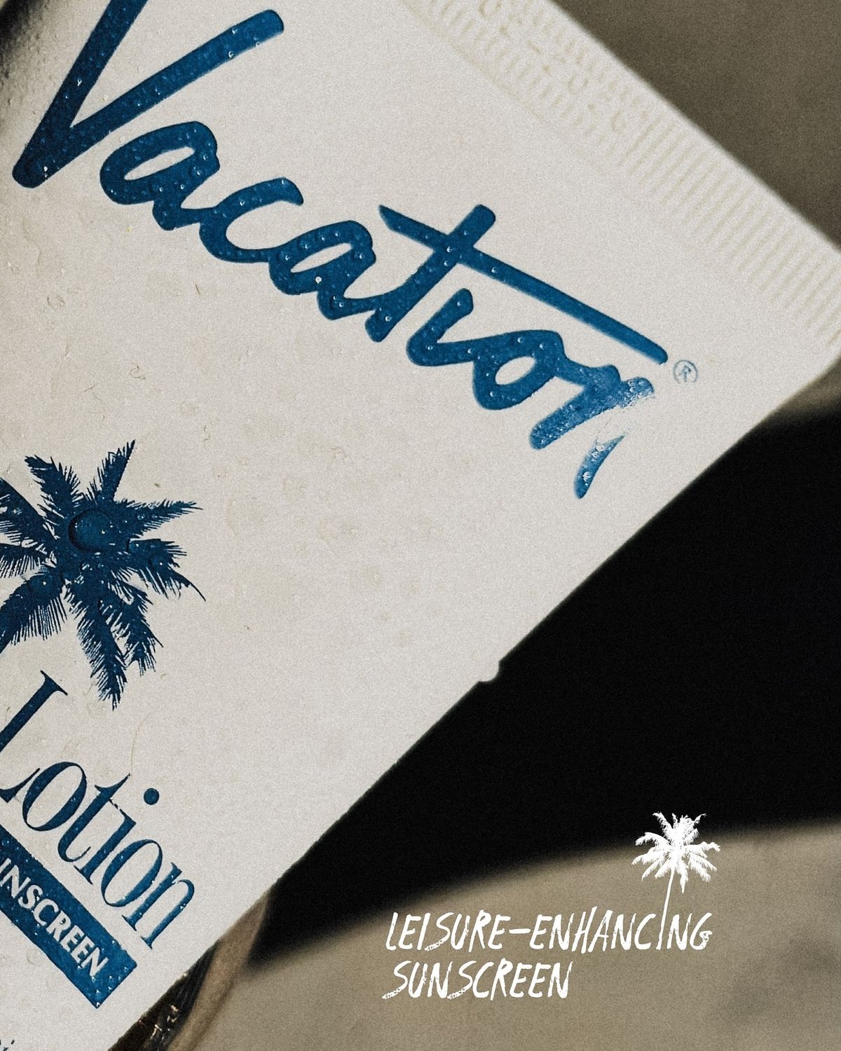 Vacation Classic Lotion SPF 30 — wordmark macro