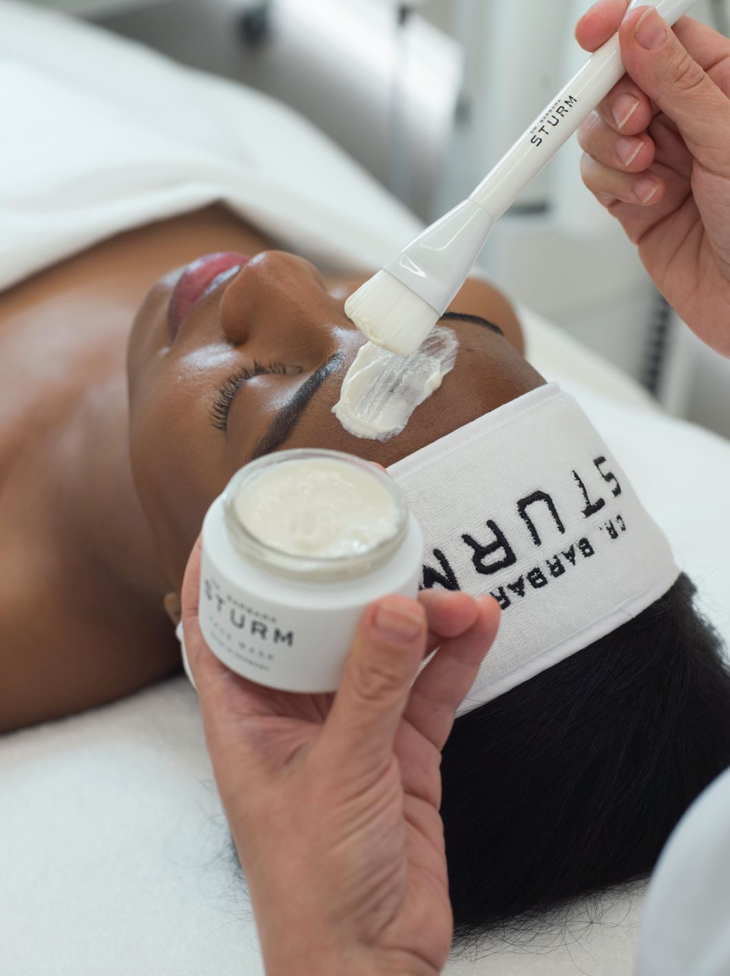 Lip filler consultation — senior nurse injector with patient