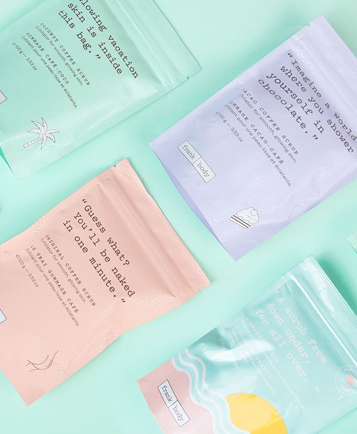 Frank Body Cheek Mask Sheet packets — pastel coloured flatlay