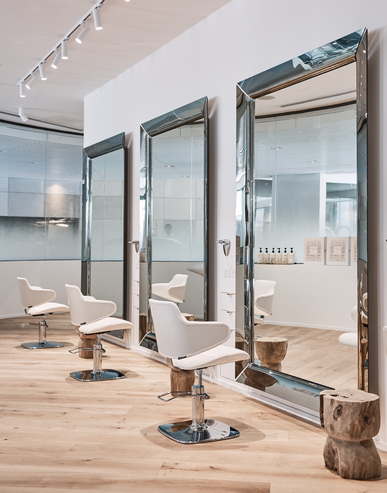 Koda Cutters — white cutting room with mirrors