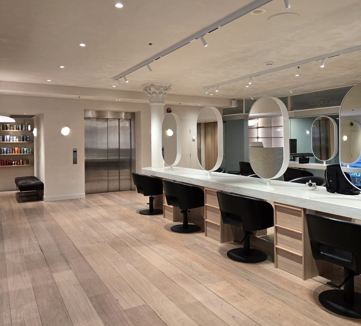 TONI&GUY Melbourne chandelier row interior