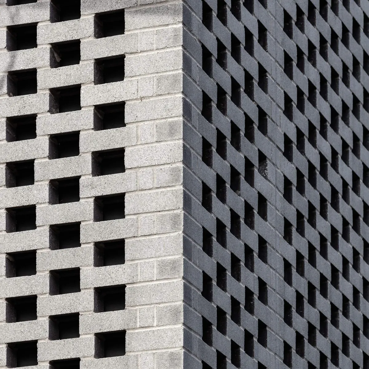 Close-up of the building’s hit-and-miss grey brick screen