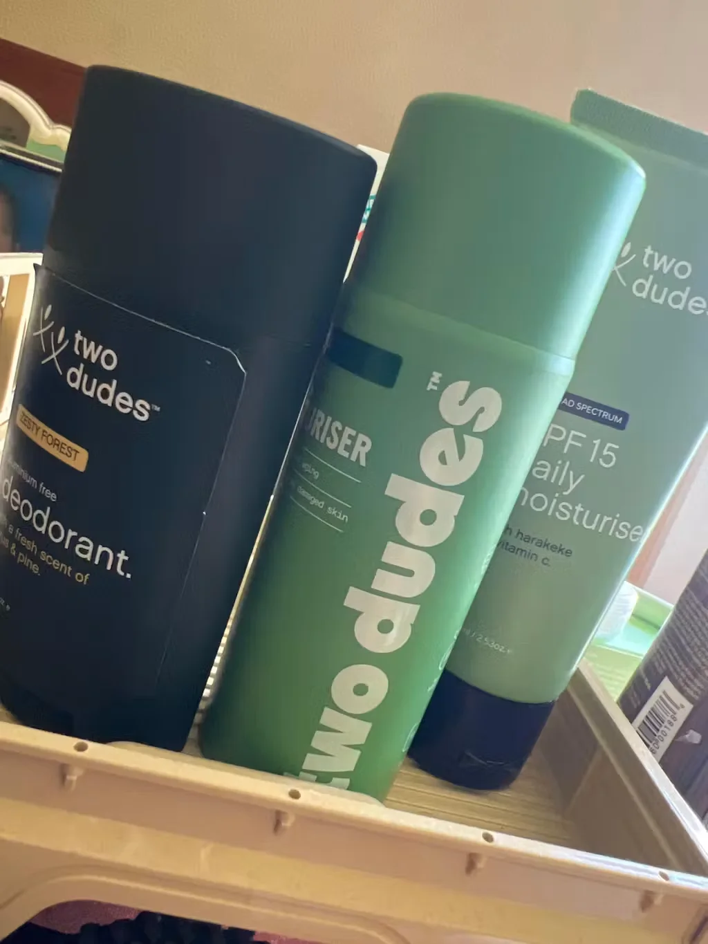 Two Dudes Deodorant, Moisturiser and SPF15 Daily Moisturiser on the bathroom shelf